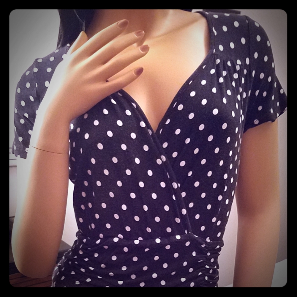 Black short sleeved dress with white polka dots